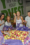 2015 09 11 - KK volunteers her labor to bag fruit with workers at City Harvest's Food Rescue Facilit (2015)